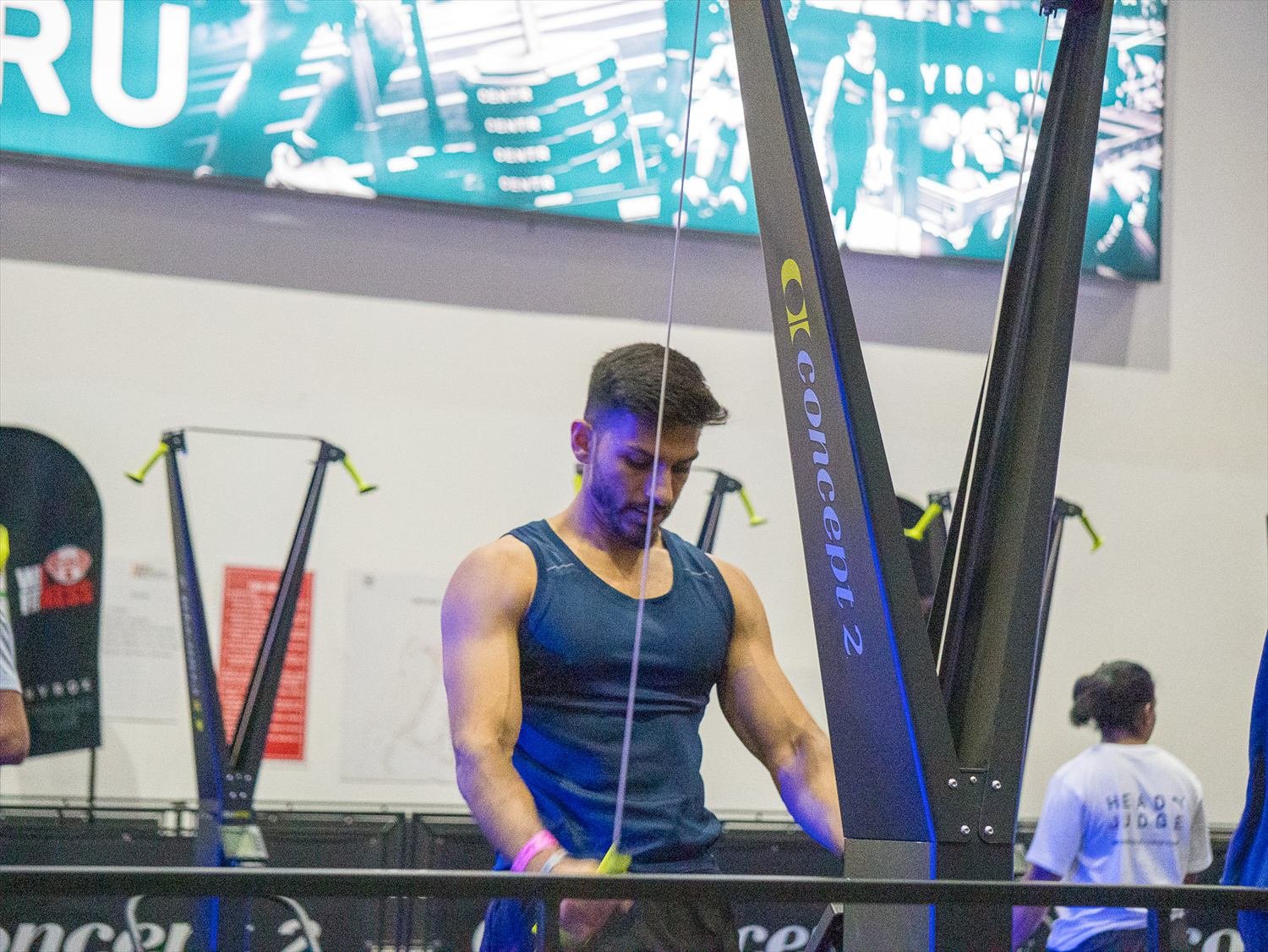 Athlete working on a SkiErg during a hybrid event